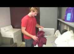 Sexy mom gives a sloppy bj on young guy Joey in the laundry room at seemomsuck.com...
